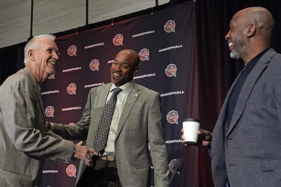 From left to right, Doug Collins, Vince Carter and Chauncey Billups talk after a news conference for The Naismith Basketball Hall of Fame at the NCAA college basketball Tournament on Saturday, April 6, 2024, in Phoenix. (AP Photo/David J. Phillip)
