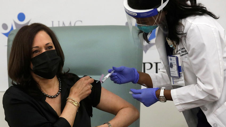 Vice President-elect Kamala Harris receives a dose of the Moderna COVID-19 vaccine at United Medical Center in Washington, D.C., on Tuesday. (Leah Millis/Reuters)