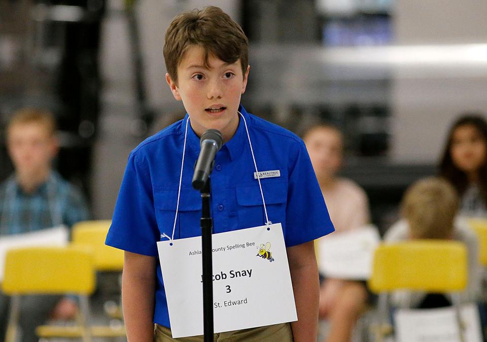 St. Edward School's Jacob Snay correctly spells "microbial" to win the sixth-grade spelldown at the 48th annual Ashland County spelling bee Tuesday, held at the Ashland County-West Holmes Career Center.