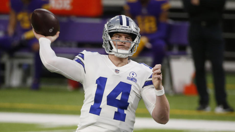 Dallas Cowboys quarterback Andy Dalton throws a pass during an NFL football game against the Minnesota Vikings, Sunday, Nov. 22, 2020, in Minneapolis. (AP Photo/Bruce Kluckhohn)