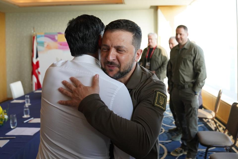 Rishi Sunak and Volodymyr Zelensky were pictured embracing on Saturday (Getty Images)