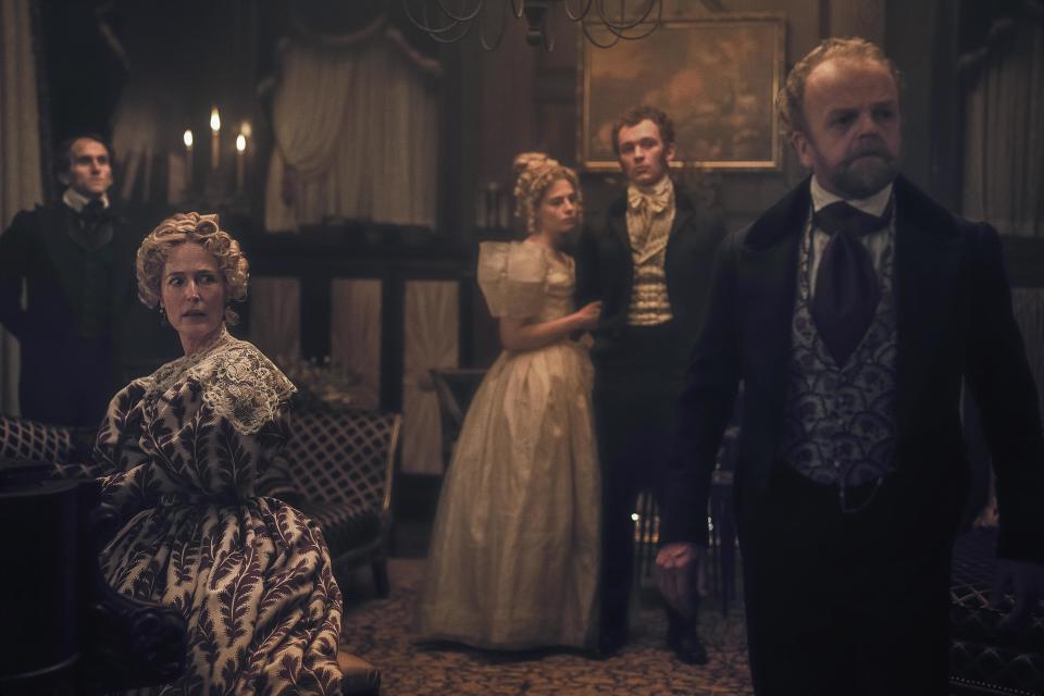 (L to R) Gillian Anderson as Julia, Harry Melling as Edgar Allen Poe, Lucy Boynton as Lea, Harry Lawtey as Artemus, and Toby Jones as Dr. Marquis in <em>The Pale Blue Eye</em><span class="copyright">Scott Garfield—Netflix</span>