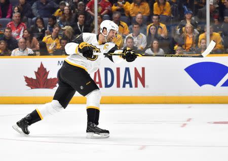 Jan 31, 2016; Nashville, TN, USA; Pacific Division forward John Scott (28) of the Montreal Canadiens attempts a shot on a breakaway during the 2016 NHL All Star Game at Bridgestone Arena. Mandatory Credit: Christopher Hanewinckel-USA TODAY Sports