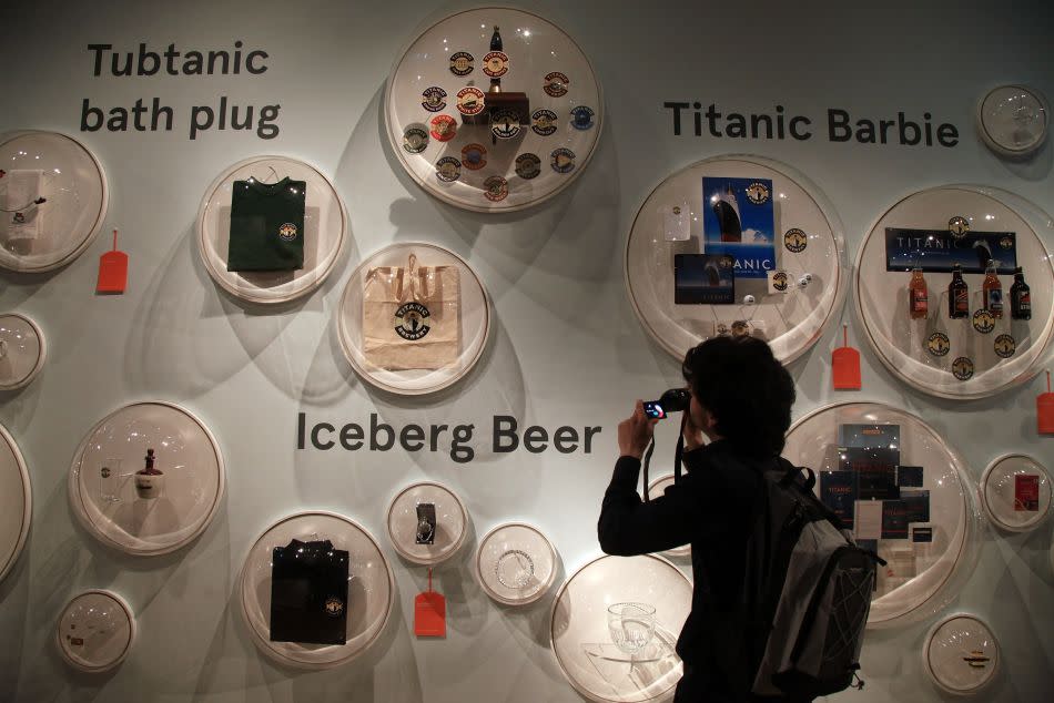 A visitor to SeaCity Museum looks at Titanic mechandise exhibited at the museum's Titanic exhibition on April 3, 2012 in Southampton, England. (Photo by Matt Cardy/Getty Images)