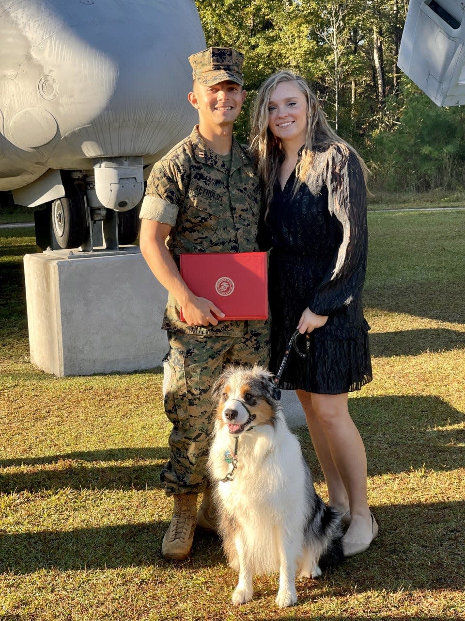 Ross Reynolds and Lana Reynolds, with their dog, Frodo.