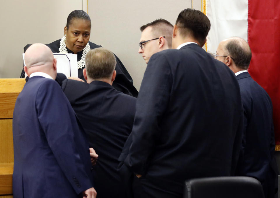 Judge Tammy Kemp calls prosecutors and defense attorneys to the bench during pretrial arguments in the Amber Guyger murder trial in the 204th District Court in Dallas, Monday, September 23, 2019. Guyger shot and killed Botham Jean, an unarmed 26-year-old neighbor in his own apartment last year. She told police she thought his apartment was her own and that he was an intruder. (Tom Fox/The Dallas Morning News, Pool)