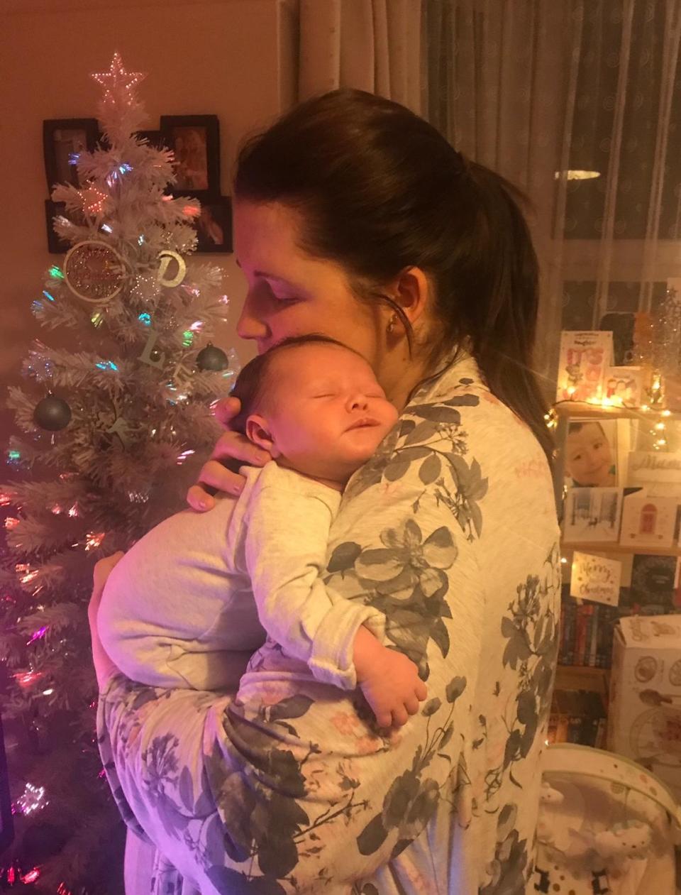 Tara and Sofia having a cuddle at Christmas as a baby (Collect/PA Real Life)