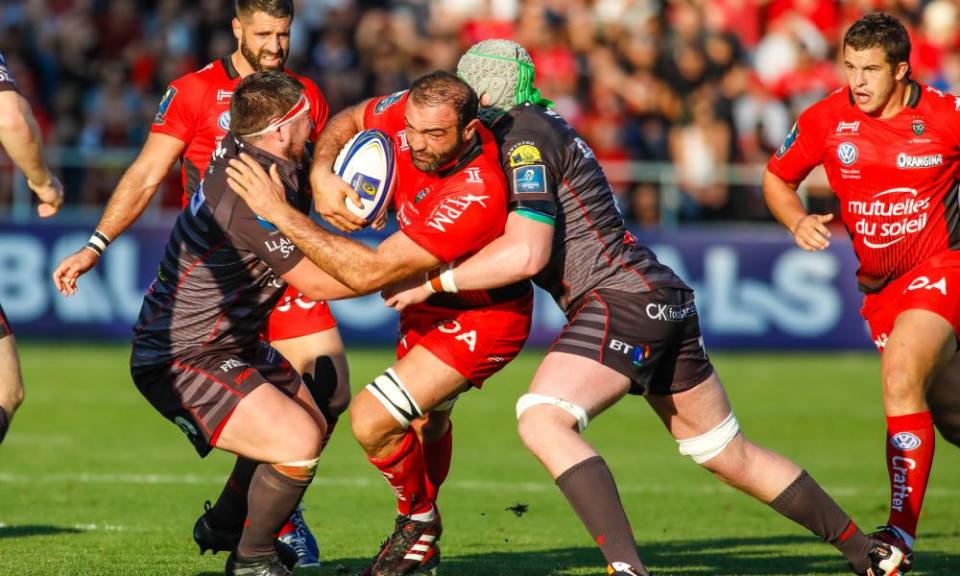 Toulon’s Mamuka Gorgodze runs into a brawny barrier against Scarlets.