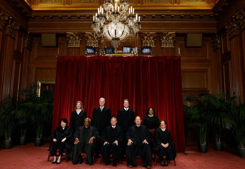 FILE PHOTO: U.S. Supreme Court justices pose for their group portrait at the Supreme Court in Washington