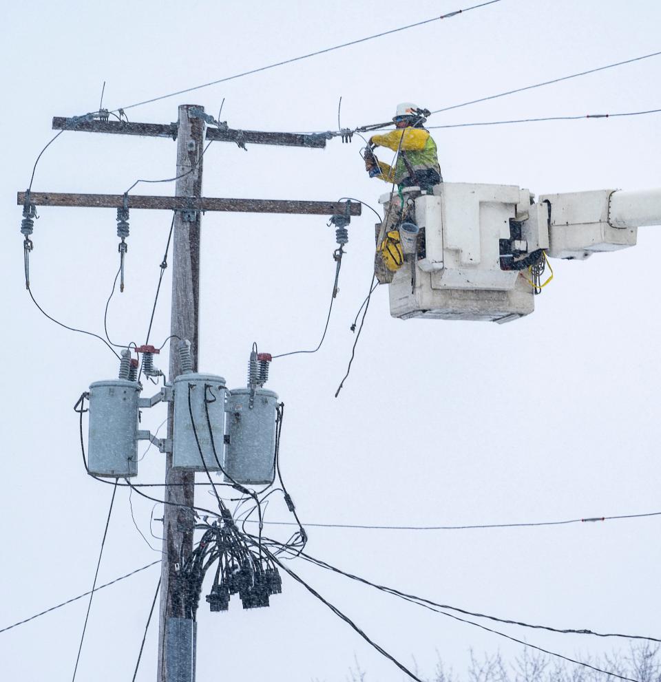 A We Energies linemen works to maintain the distribution lines during the snowstorm on Friday January 12, 2024 at W. Layton Ave. & S. 21st St. in Milwaukee, Wis.