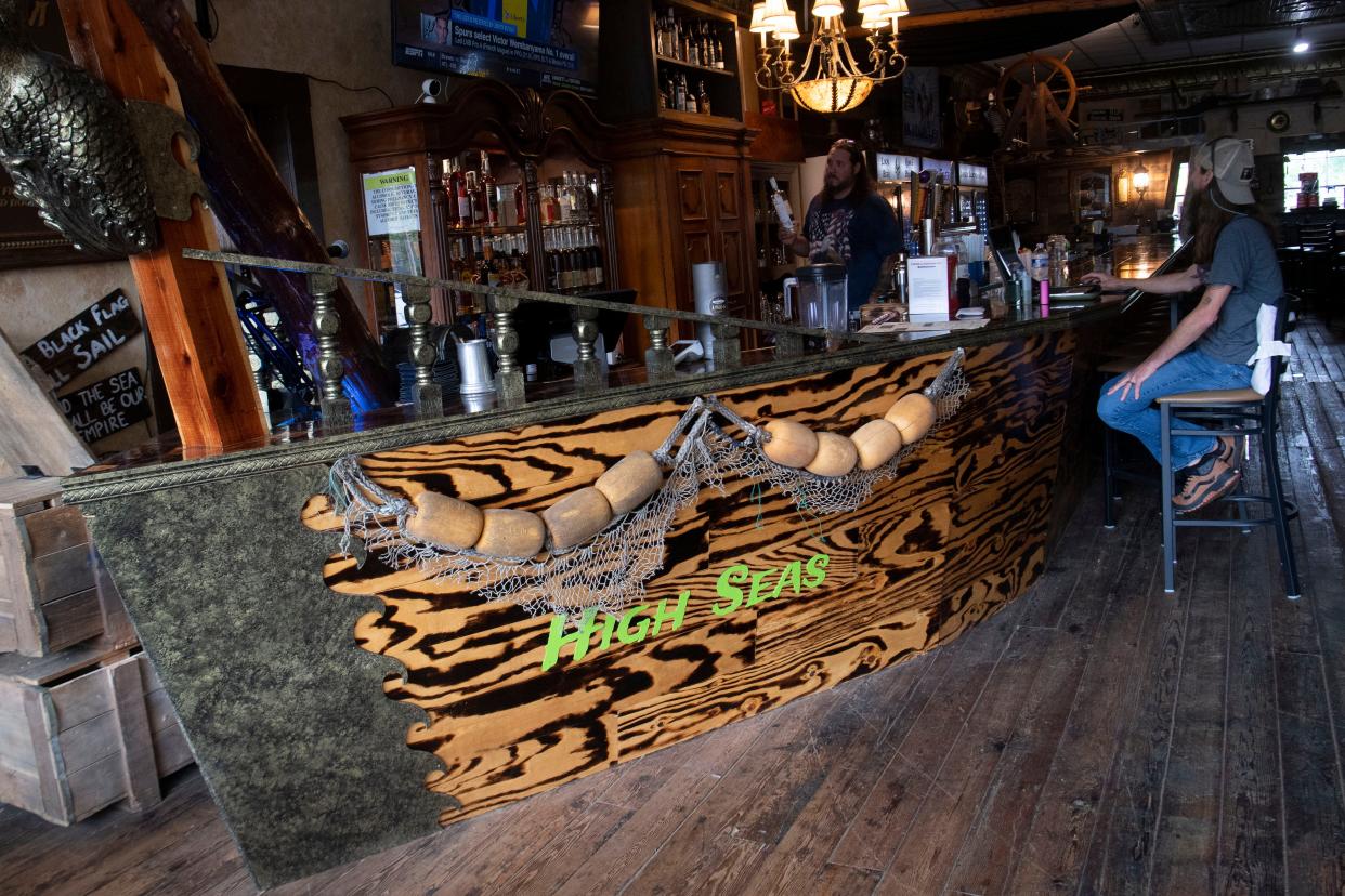 A 60-foot pirate ship bar is the centerpiece of  Pirate Tavern & eVape Dispensary at 1207 N. Central St. The new Happy Holler business took over the former Time Warp Tea Room space in 2023.