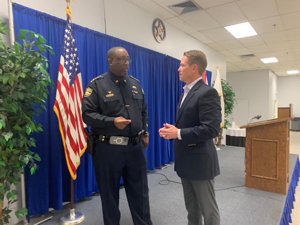 Jacksonville Sheriff T.K. Waters, a left, talks with mayoral candidate Daniel Davis after Waters endorsed Davis on Tuesday, Jan. 24, 2023 at the Fraternal Order of Police lodge.