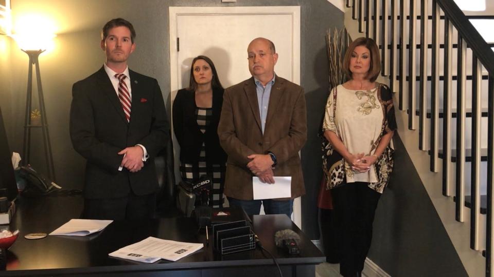 Attorney Matthew Harris, left, and retired Air Force Col. David Lewis take questions during a press conference announcing a lawsuit against Carl Tepper on March 24, 2022.