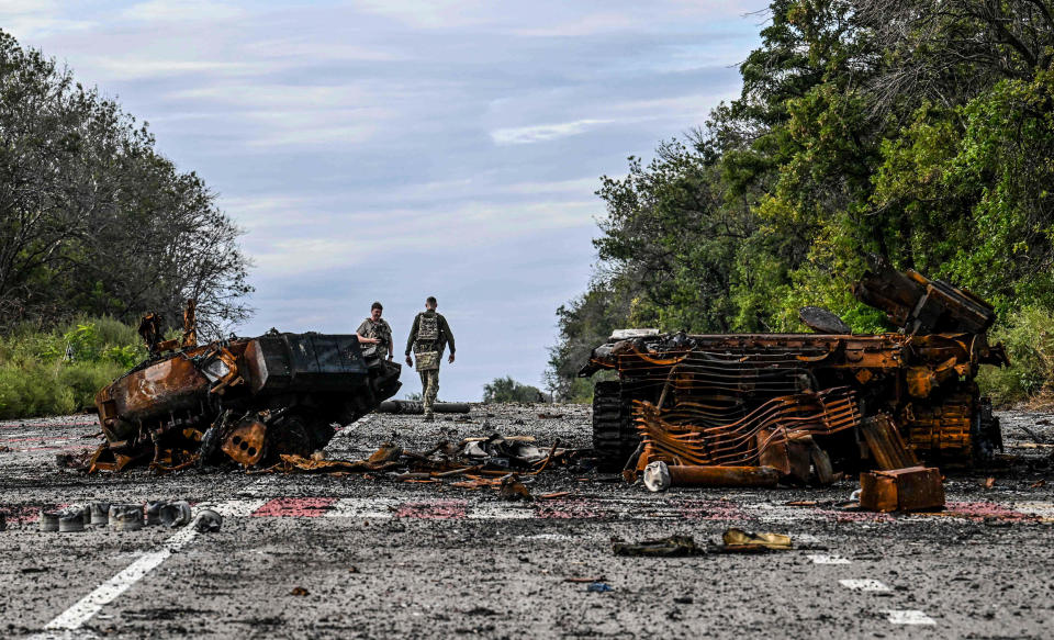 Image: Destroyed armored vehicles litter the road in Balakliya, Kharkiv region, Ukraine on Sept. 10, 2022. (Juan Barreto / AFP - Getty Images)