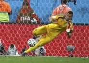 Argentina's goalkeeper Sergio Romero saves a penalty kick by Ron Vlaar of the Netherlands during the penalty shootout in their 2014 World Cup semi-finals at the Corinthians arena in Sao Paulo July 9, 2014. REUTERS/Michael Dalder (BRAZIL - Tags: SOCCER SPORT WORLD CUP)