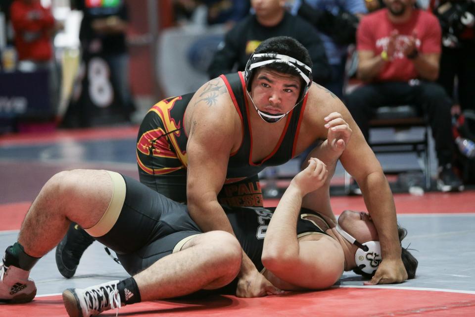 Palm Desert heavyweight Daniel Herrera wins his semifinal match at the CIF-SS Masters Meet on Friday at Palm Springs High School.