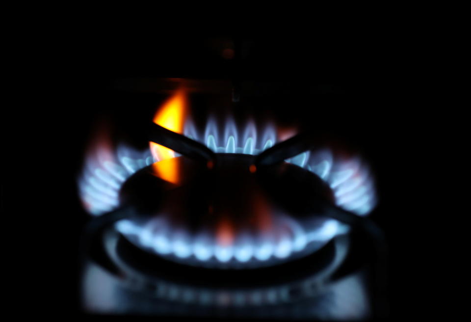 Flames come out of a domestic gas ring of an oven in Durham, Britain, September 23, 2021. REUTERS/Lee Smith