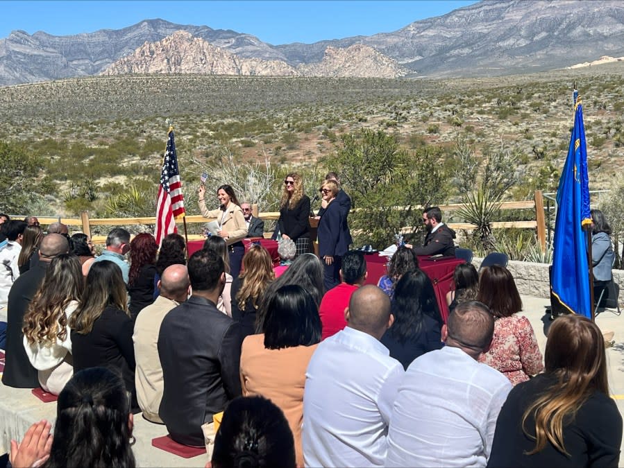 61 people from 20 different countries celebrated U.S. citizenship at Red Rock Canyon Saturday morning. (KLAS/Lauren Negrete)