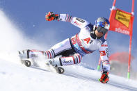 France's Alexis Pinturault speeds down the course during an alpine ski, men's World Cup giant slalom in Soelden, Austria, Sunday, Oct. 18, 2020. (AP Photo/Marco Trovati)