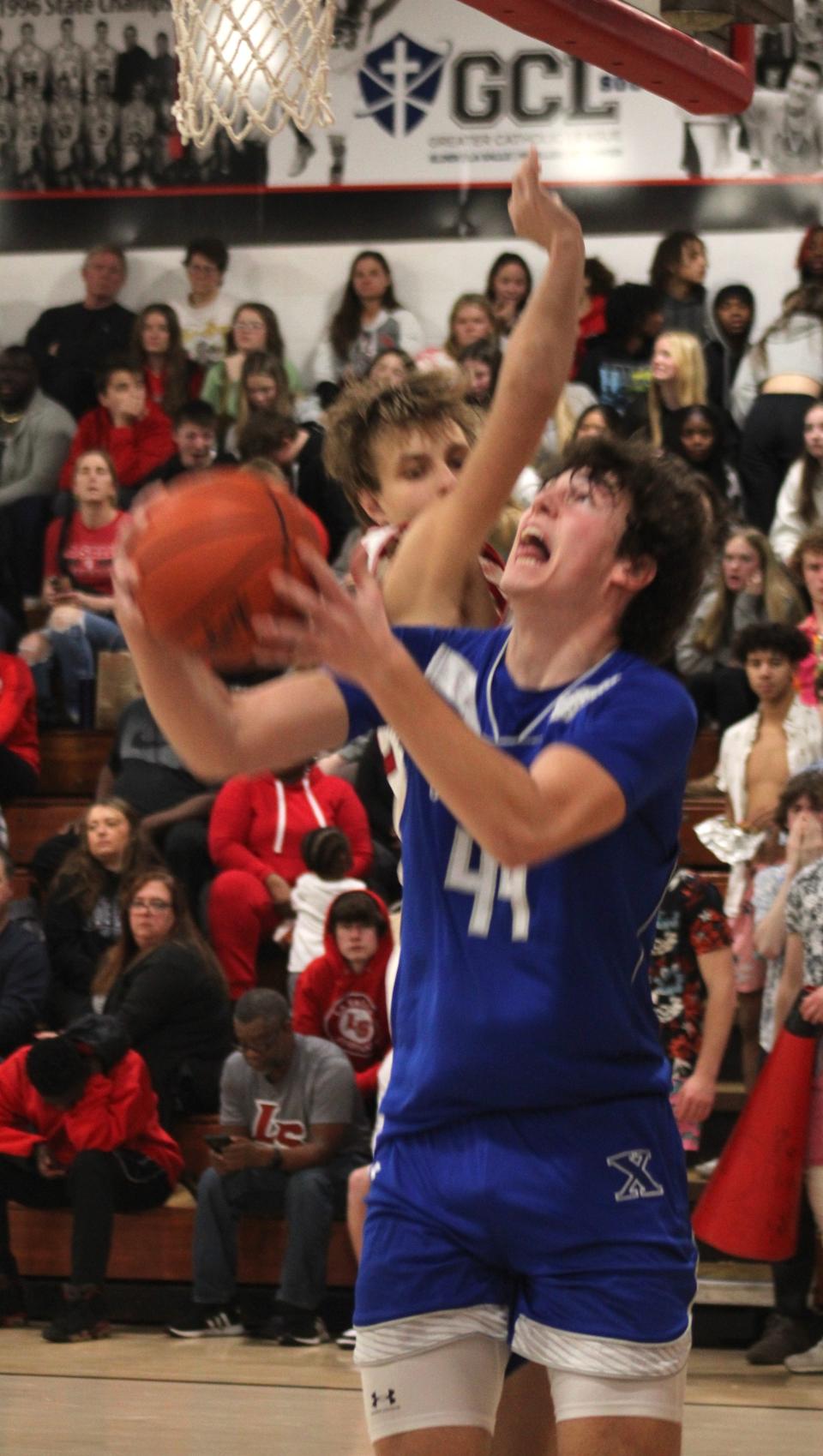 St. Xavier junior Jacob Wassler scored a basket as St. Xavier defeated La Salle 54-53 in boys basketball Jan. 12, 2024 at La Salle.