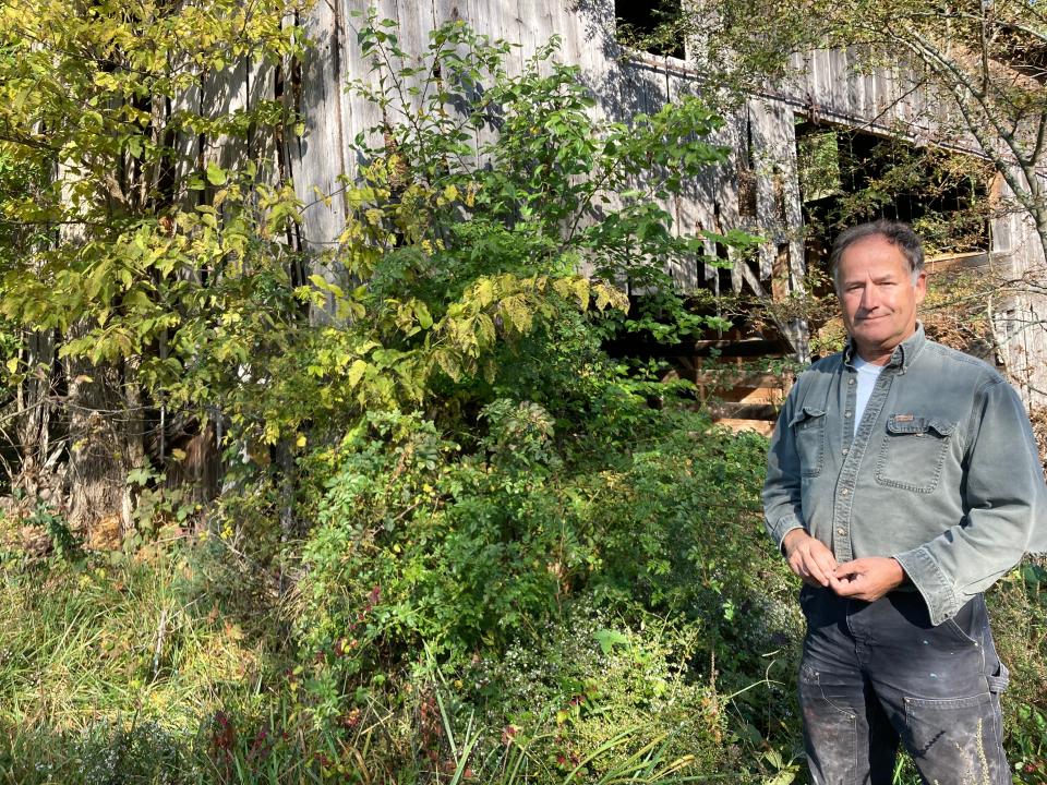 Douglas Beckman stands by an old barn in Prairie Grove Township. The barn is the only structure still standing along the field once used by his great-uncle, Walter Beckman. Located nearby is the foundation of an old home and a downed windmill. The farm has been in Beckman's family since 1902 and recently was designated as a Century Farm by the Iowa Department of Agriculture and Land Stewardship and Iowa Farm Bureau. It is the second of his farms to be given such a distinction.