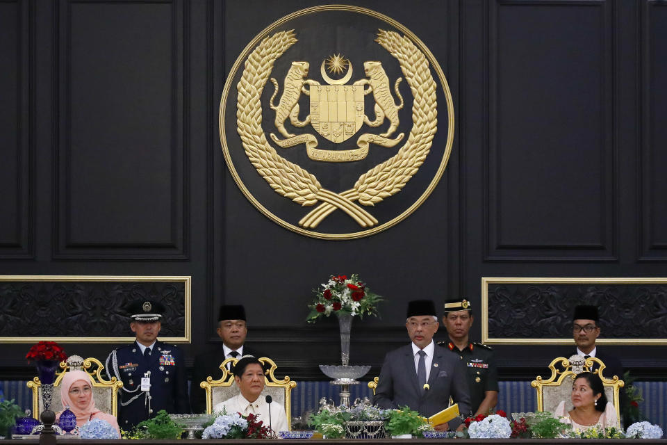 Malaysia's King Sultan Abdullah Sultan Ahmad Shah, second from right, delivers a speech while Malaysia's Queen Azizah Aminah Maimunah, left, Philippine President Ferdinand Marcos Jr., second from left, and first lady Maria Louise Araneta Marcos, right, look on during the state banquet ceremony at National Palace in Kuala Lumpur, Malaysia, Wednesday, July 26, 2023. (Fazry Ismail/Pool Photo via AP)