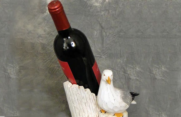 <b>7. Seagull Wine:</b> This one has to be the manliest drink around. Invented by the Eskimos to brave the cold arctic weather, this one is made by mutilating a seagull, chopping it into pieces or storing it whole in a bottle of water, and leaving it in the sun for a prolonged period of time till it ferments.