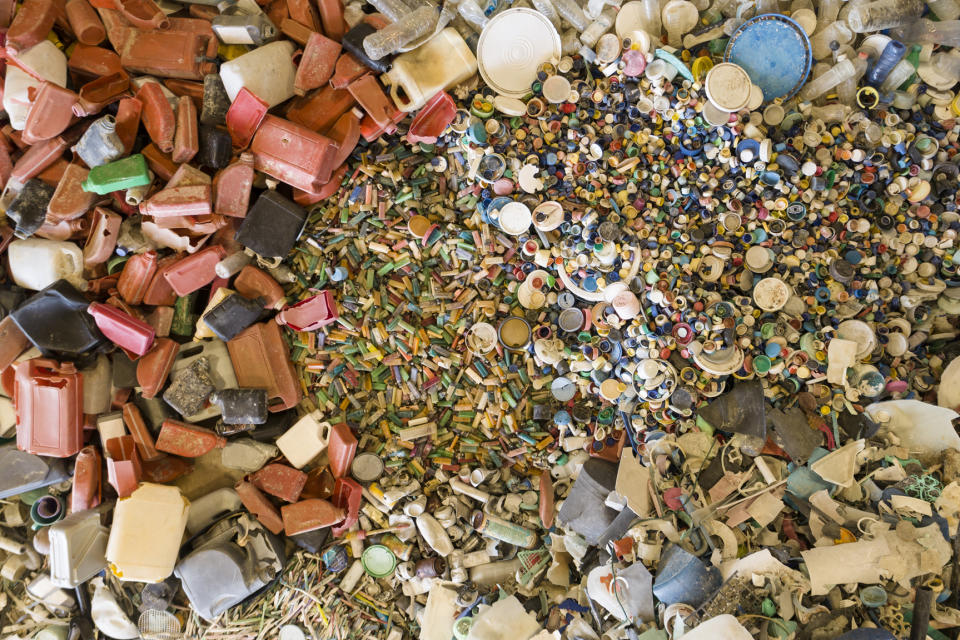 An aerial view of lighters, bottle caps, oil bottles and other items collected from Djulpan Beach.