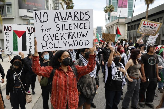 Protesters at the 2024 Oscars red carpet - Credit: Gina Ferazzi/Los Angeles Times/Getty Images