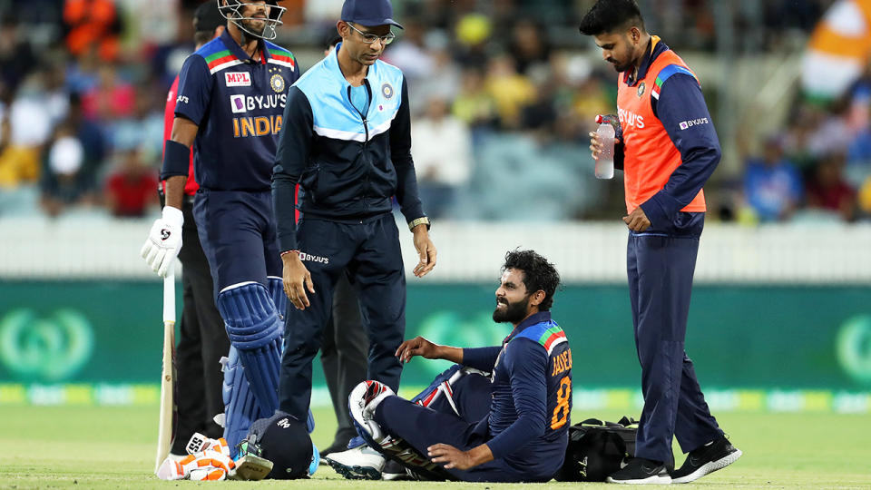 India's Ravindra Jadeja sought treatment on his hamstring during his T20 knock on Friday night, before being hit on the helmet by a short ball in the final over of India's innings. (Photo by Mark Kolbe/Getty Images)