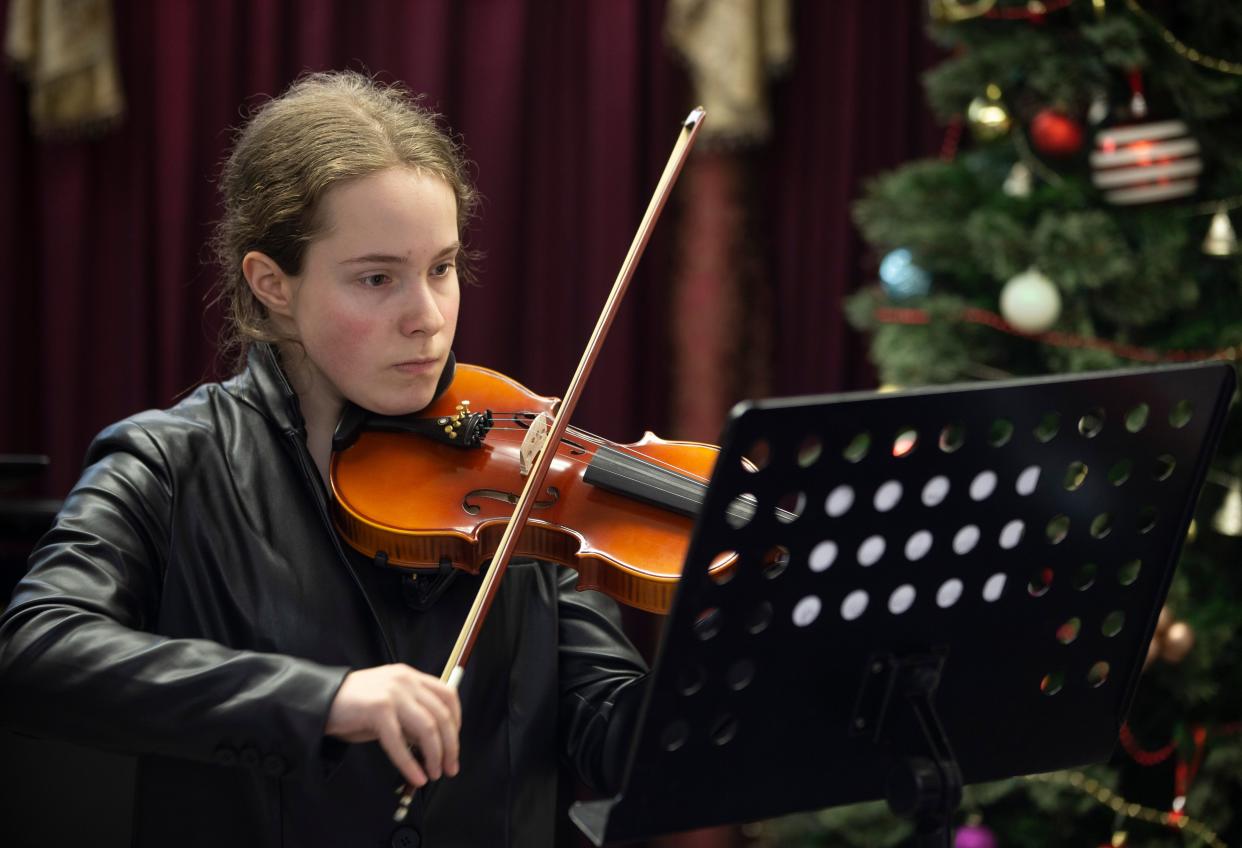 The Music & Art Academy has opened its doors to students at a new facility in Holmdel. Student Elizabeth Rizov, 15, performs during a recital at the academy.  
Holmdel, NJ
Thursday, December 14, 2023