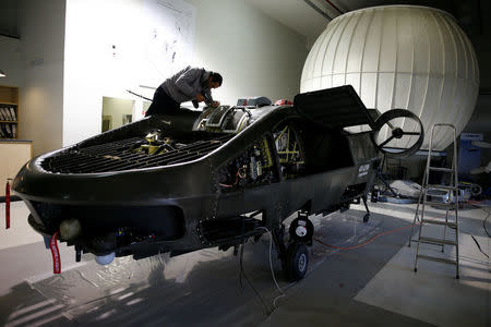 A worker works on a prototype of the Cormorant, a drone, at Urban Aeronautics' workshop in Yavne, Israel December 22, 2016. REUTERS/Amir Cohen