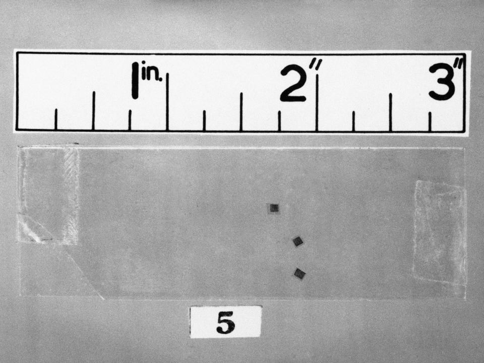 These three microdots, magnified several times, featured as exhibits in the spy trial at the Old Bailey in London on March 22, 1961.