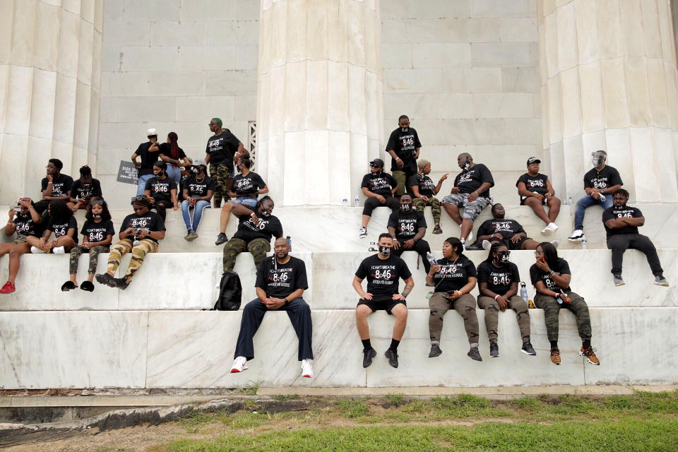 People attend the March on Washington on Aug. 28, 2020, at the Lincoln Memorial. (Julius Constantine Motal / NBC News)