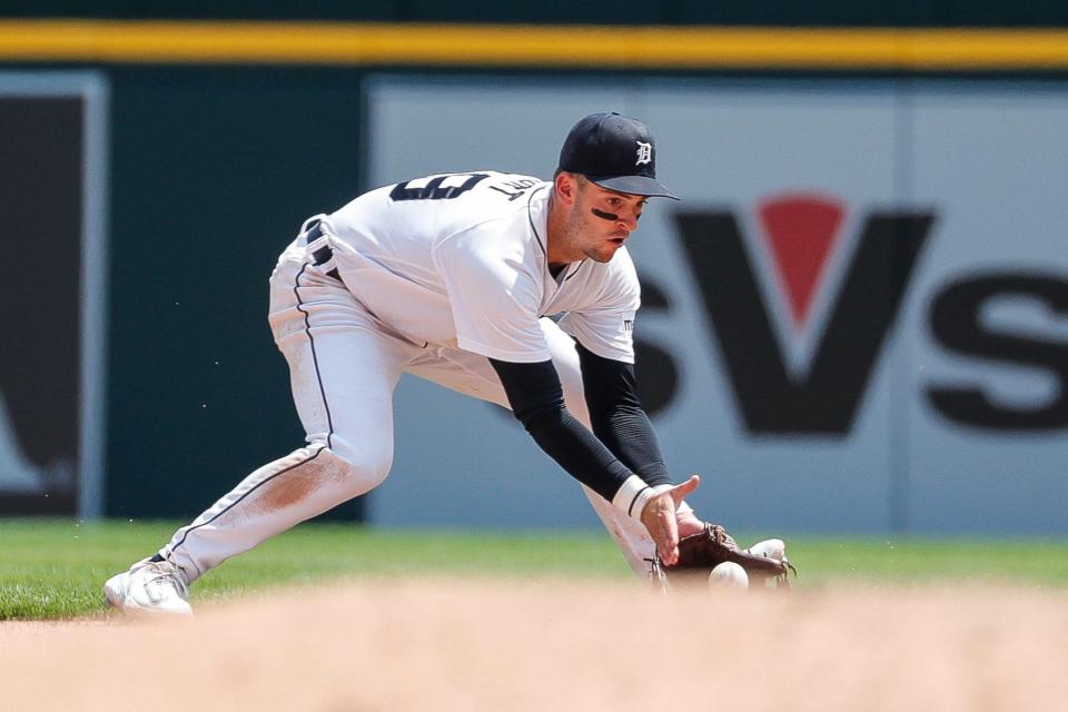 Detroit Tigers second baseman Zack Short (59) catches a ground ball during the seventh inning against Kansas City Royals at Comerica Park in Detroit on Wednesday, June 21, 2023.