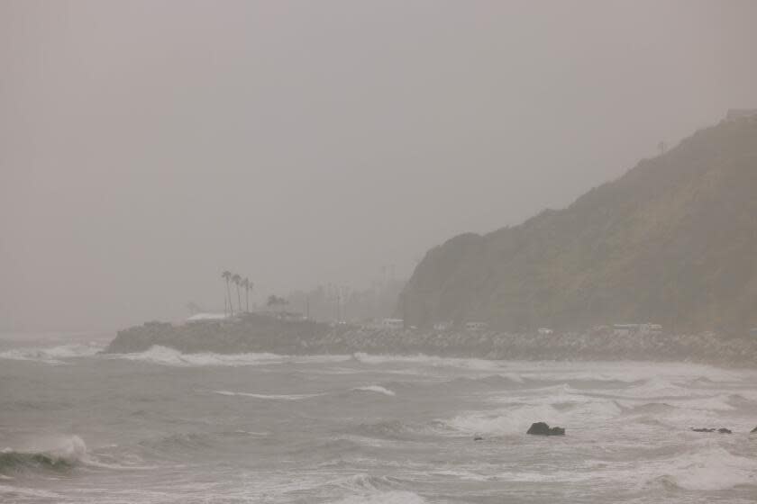 Malibu, CA - February 04: Rain is seen along the coast on Sunday, Feb. 4, 2024 in Malibu, CA. Officials across Southern and Central California are urgently warning residents to prepare as a storm system fueled by an atmospheric river brings heavy rainfall. (Dania Maxwell / Los Angeles Times)