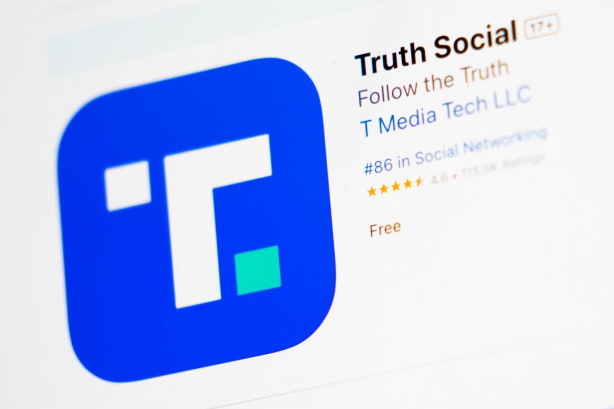 PHOTO: The download screen for Truth Social app is seen on a laptop computer, March 20, 2024, in New York. (John Minchillo/AP, FILE)