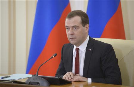 Russia's Prime Minister Dmitry Medvedev chairs a government meeting in the Crimean city of Simferopol, March 31, 2014. REUTERS/RIA Novosti/Alexander Astafyev/Pool