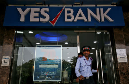 A watchman steps out of a Yes Bank branch in Mumbai, India, September 21, 2018. REUTERS/Francis Mascarenhas
