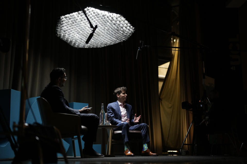 OpenAI's CEO Sam Altman, right, the founder of ChatGPT and creator of OpenAI gestures while speaking to moderator Azeem Azhar at University College London, as part of his world tour of speaking engagements in London, Wednesday, May 24, 2023.(AP Photo/Alastair Grant)