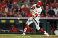Cincinnati Reds' Joey Votto hits a two-run home run during the third inning of a baseball game against the Pittsburgh Pirates in Cincinnati, Monday, Sept. 20, 2021. (AP Photo/Aaron Doster)