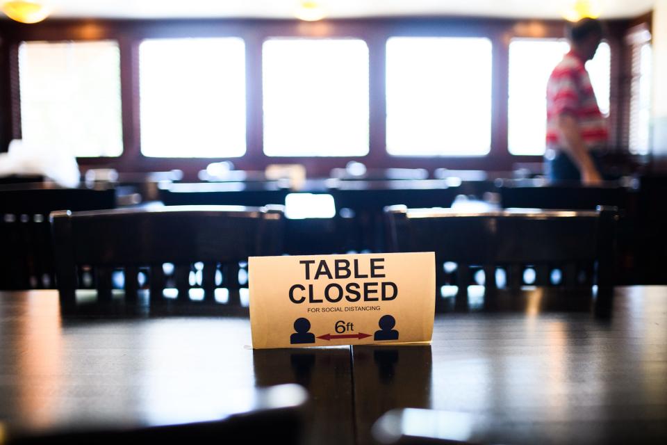 The staff at Luigi's Italian Chophouse and Bar get the restaurant ready for sit down customers on Friday, May 22, 2020.