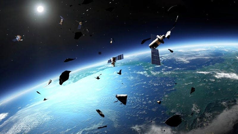 Artist’s impression of space junk orbiting Earth.