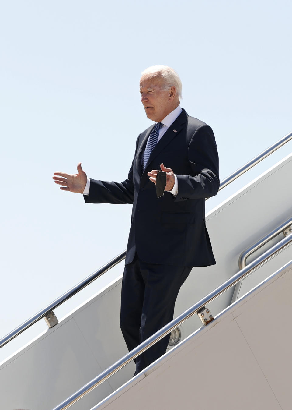 U.S. President Joe Biden walks down the steps of Airforce One on arrival at the Torreon air base in Madrid, Spain, Tuesday June 28, 2022. North Atlantic Treaty Organization heads of state will meet for a NATO summit in Madrid from Tuesday through Thursday. (J.J.Guillen/Pool photo via AP)