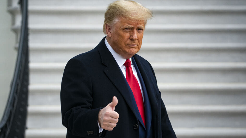 U.S. President Donald Trump gives a thumbs up as he departs on the South Lawn of the White House, on December 12, 2020 in Washington, DC. (Photo by Al Drago/Getty Images)
