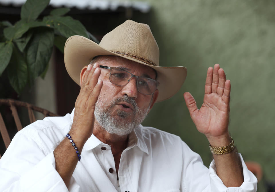 FILE - Hipolito Mora, founder of the state's civilian armed self-defense movement, speaks during an interview at his home in Ruana, Michoacan state, Mexico, Oct. 3, 2019. Mora has been killed on Thursday, June 29, 2023, in a successful attempt on his life. (AP Photo/Marco Ugarte, File)