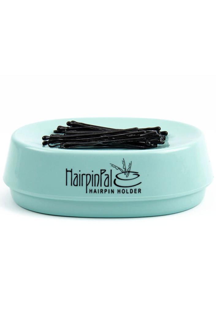 <p><strong>HairpinPal</strong></p><p>amazon.com</p><p><strong>$15.98</strong></p><p><a href="https://www.amazon.com/dp/B00XZCTI7G?tag=syn-yahoo-20&ascsubtag=%5Bartid%7C10055.g.38414112%5Bsrc%7Cyahoo-us" rel="nofollow noopener" target="_blank" data-ylk="slk:Shop Now" class="link rapid-noclick-resp">Shop Now</a></p><p>This lil magnet tray will make sure that your bobby pins never run off and go missing ever again—as long as you remember to put them back on top of it, of course.</p>