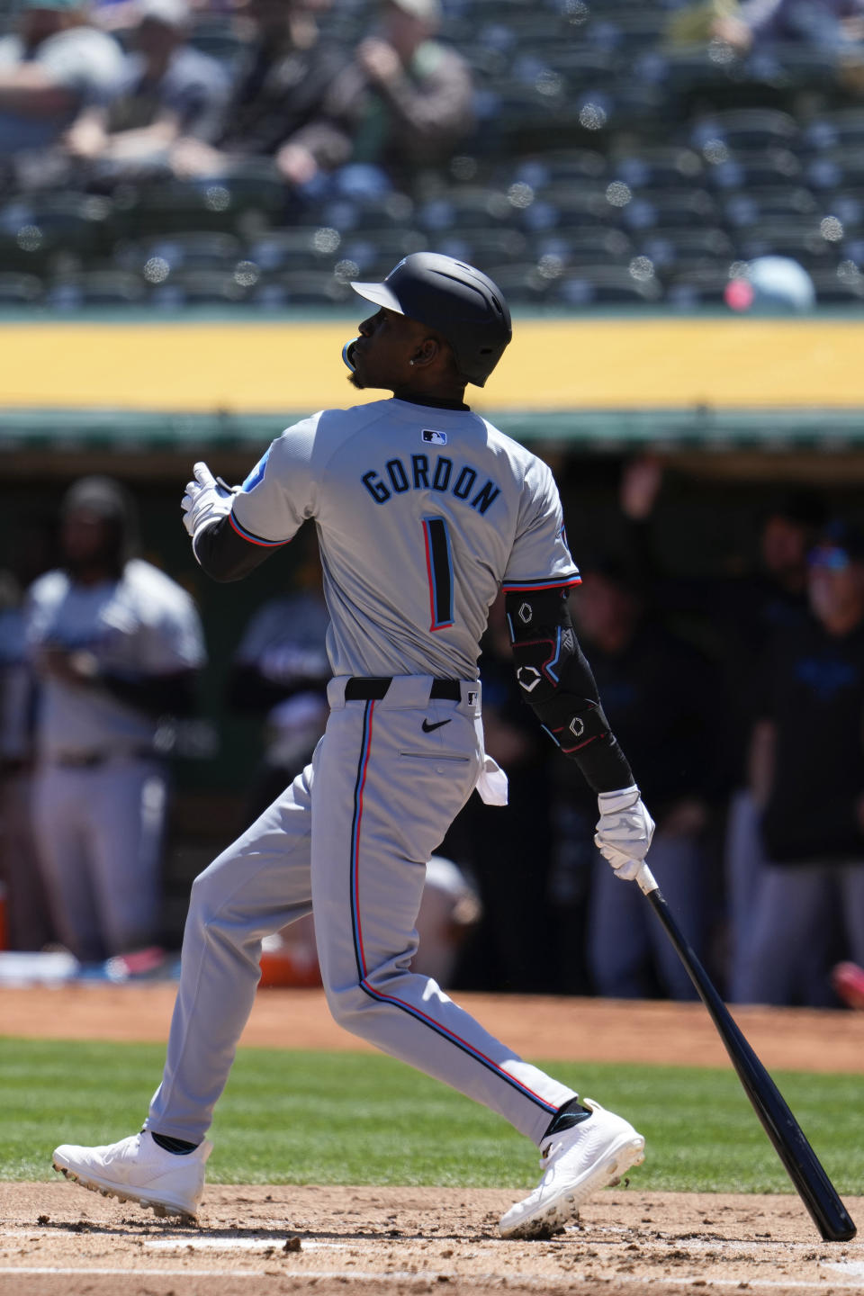 Miami Marlins' Nick Gordon watches his three-run home run against the Oakland Athletics during the first inning of a baseball game, Sunday, May 5, 2024, in Oakland, Calif. (AP Photo/Godofredo A. Vásquez)