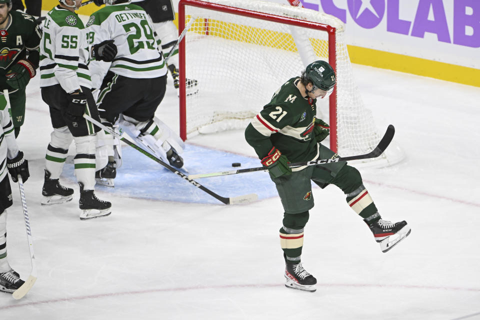 Minnesota Wild right wing Brandon Duhaime (21) celebrates after scoring a goal against the Dallas Stars during the first period of an NHL hockey game Sunday, Nov. 12, 2023, in St. Paul, Minn. (AP Photo/Craig Lassig)