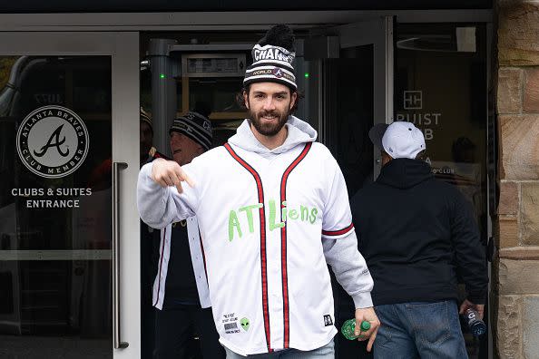 ATLANTA, GA - NOVEMBER 05: Fans cheer for Dansby Swanson of the Atlanta Braves as he gets on the buses before their World Series Parade at Truist Park on November 5, 2021 in Atlanta, Georgia. The Atlanta Braves won the World Series in six games against the Houston Astros winning their first championship since 1995. (Photo by Megan Varner/Getty Images)